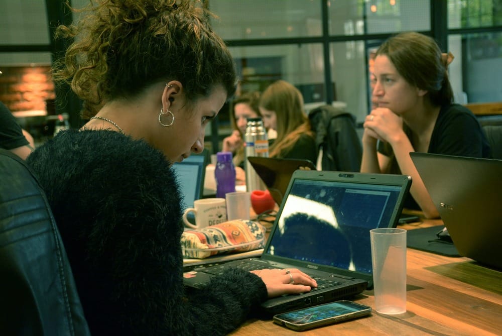 Woman starting affiliate marketing business using a laptop