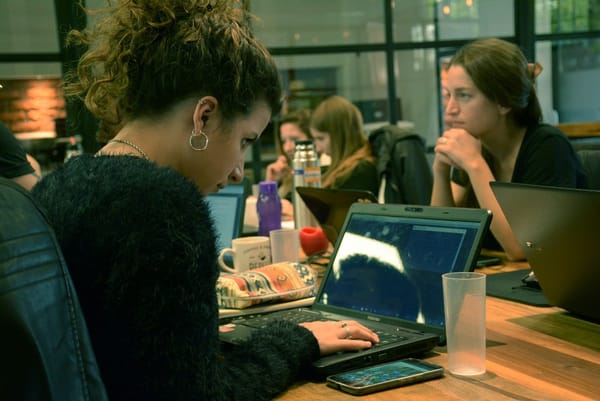 Woman starting affiliate marketing business using a laptop